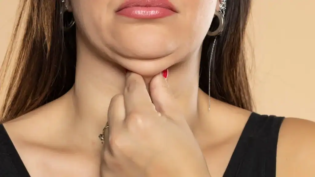 An image of a woman with double chin, sad, worried : Non Surgical Double Chin Removal Treatment in Weston Super Mare, UK